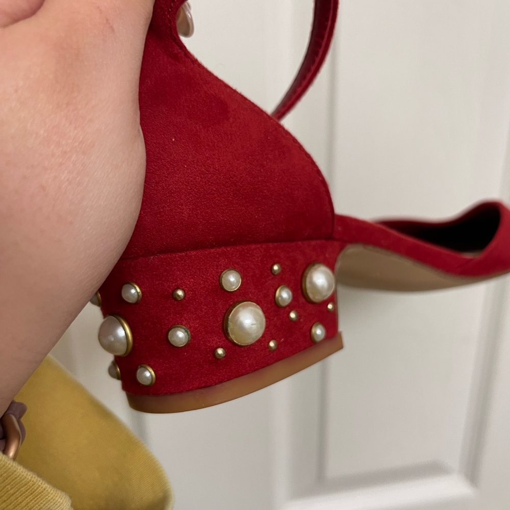 Red pearl heels